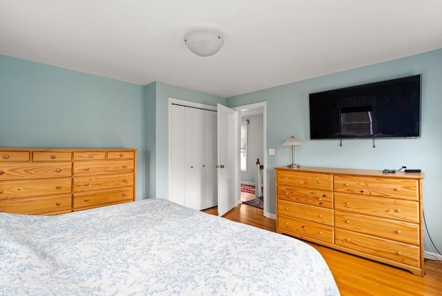 50 Walnut St, Northampton, MA 01060 - bedroom featuring wood finished floors, a closet, and baseboards