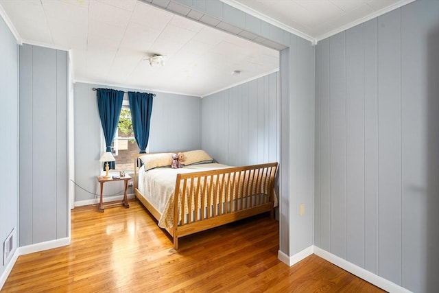 50 Walnut St, Northampton, MA 01060 - bedroom with light wood finished floors, ornamental molding, and baseboards