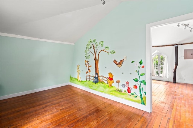 50 Walnut St, Northampton, MA 01060 - playroom featuring hardwood / wood-style flooring, vaulted ceiling, baseboards, and track lighting