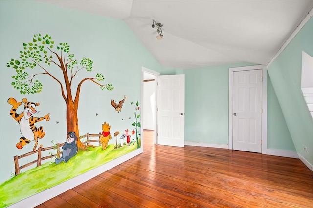 50 Walnut St, Northampton, MA 01060 - rec room featuring lofted ceiling, hardwood / wood-style floors, and baseboards