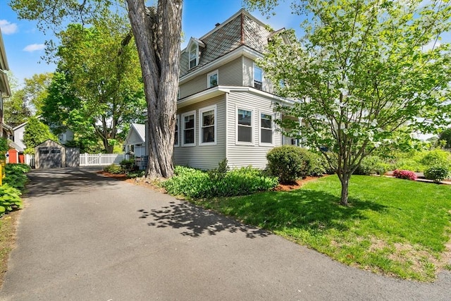 50 Walnut St, Northampton, MA 01060 - view of property exterior featuring a yard, mansard roof, and a garage