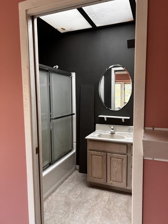 40 Papoose Lake Dr, Heath, MA 01346 - bathroom featuring vanity, combined bath / shower with glass door, and tile patterned flooring
