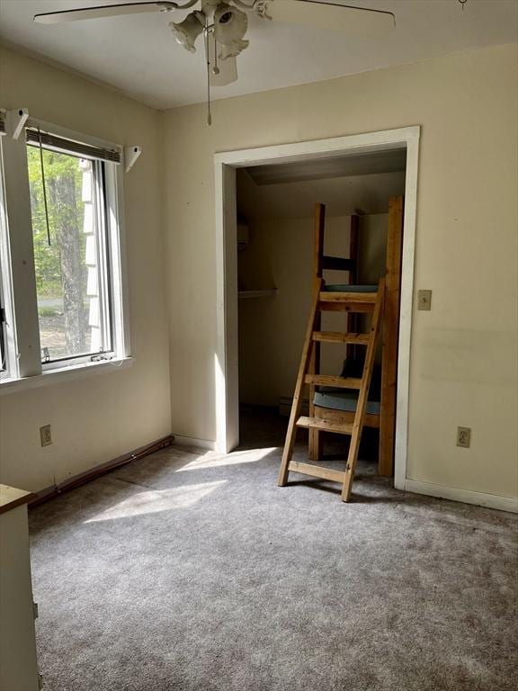 40 Papoose Lake Dr, Heath, MA 01346 - unfurnished bedroom featuring carpet, baseboards, and a ceiling fan