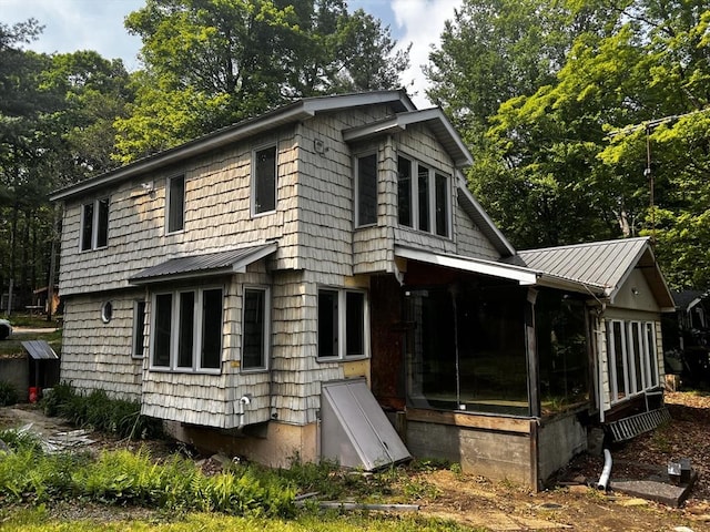 40 Papoose Lake Dr, Heath, MA 01346 - back of house featuring metal roof, a sunroom, and a standing seam roof