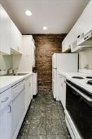 306 Columbus Ave Unit 2, Boston, MA 02116 - kitchen with white electric stove, white cabinetry, recessed lighting, and light countertops