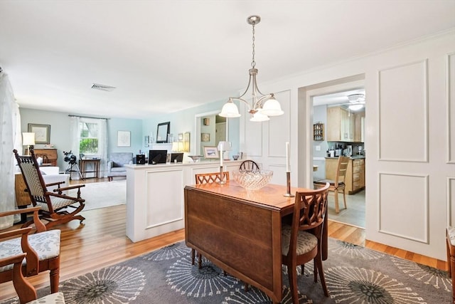 56 Conrad Rd, Melrose, MA 02176 - dining room with light wood-style floors