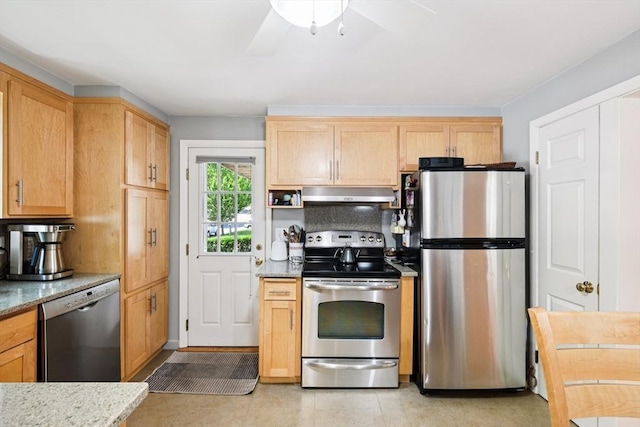 56 Conrad Rd, Melrose, MA 02176 - kitchen featuring stainless steel appliances, under cabinet range hood, a ceiling fan, light brown cabinets, and light stone counters