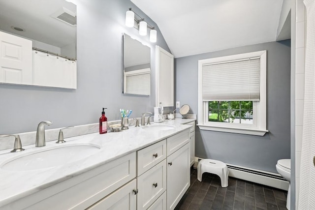 56 Conrad Rd, Melrose, MA 02176 - full bath featuring lofted ceiling, double vanity, and baseboard heating