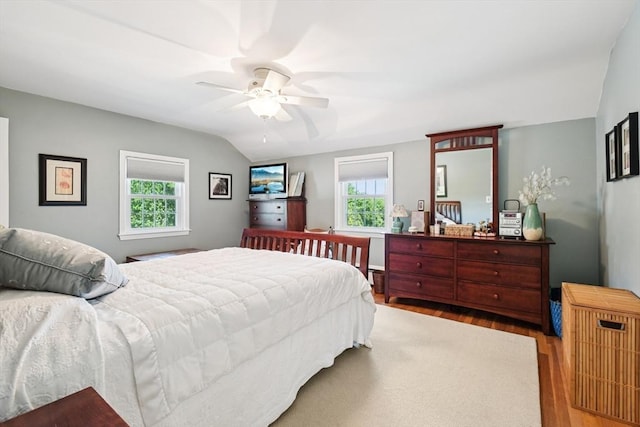 56 Conrad Rd, Melrose, MA 02176 - bedroom featuring wood finished floors, vaulted ceiling, and ceiling fan