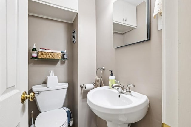 56 Conrad Rd, Melrose, MA 02176 - bathroom with toilet and a sink