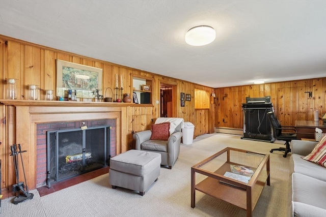 56 Conrad Rd, Melrose, MA 02176 - living area with a brick fireplace, a baseboard radiator, wooden walls, and light carpet