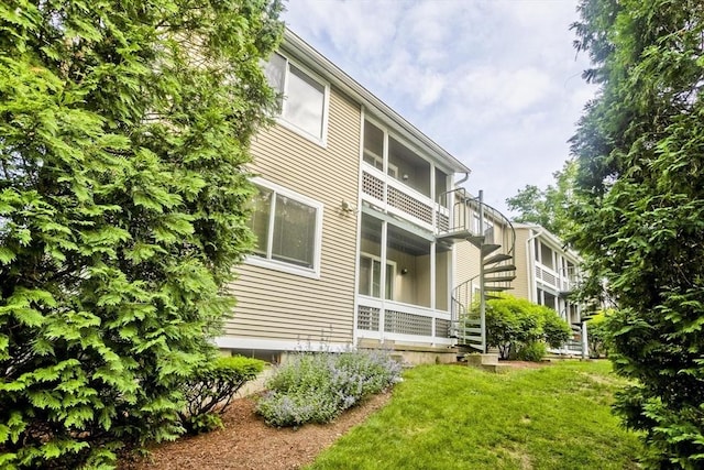 11 Arbor Way Unit C, Holyoke, MA 01040 - rear view of property with a lawn, stairway, and a balcony