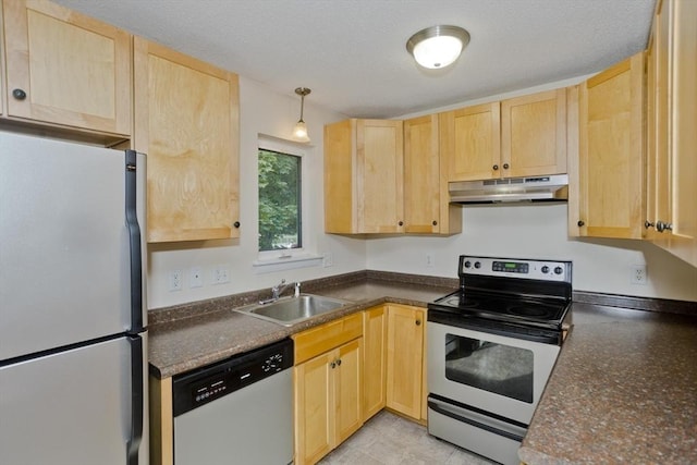 11 Arbor Way Unit C, Holyoke, MA 01040 - kitchen with stainless steel appliances, under cabinet range hood, and light brown cabinetry