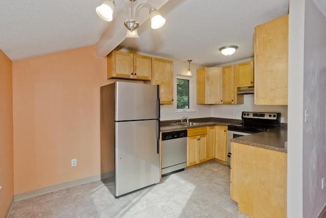 11 Arbor Way Unit C, Holyoke, MA 01040 - kitchen with appliances with stainless steel finishes, light brown cabinetry, dark countertops, and under cabinet range hood