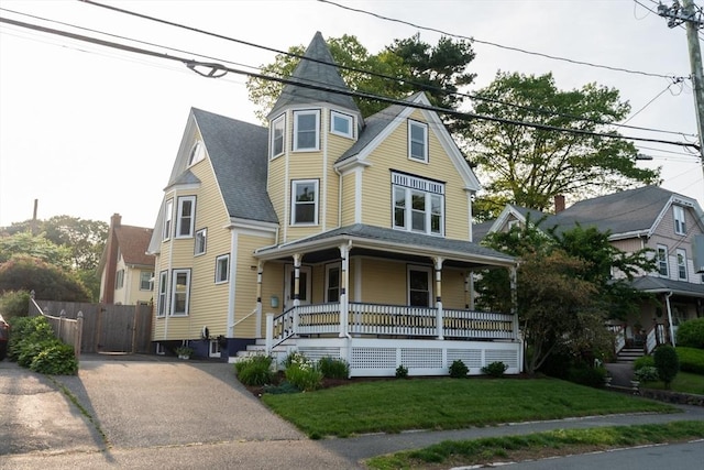 37 Chestnut St, Stoneham, MA 02180 - victorian house with covered porch, a gate, and roof with shingles