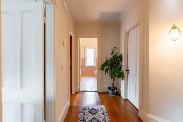37 Chestnut St, Stoneham, MA 02180 - corridor with dark wood-type flooring and baseboards