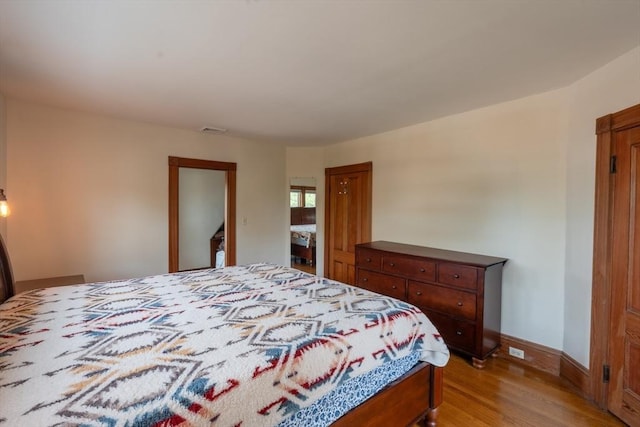 37 Chestnut St, Stoneham, MA 02180 - bedroom featuring light wood-style flooring and baseboards