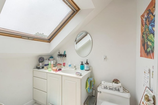 521 Pleasant St, Weymouth, MA 02190 - bathroom with vanity and a skylight