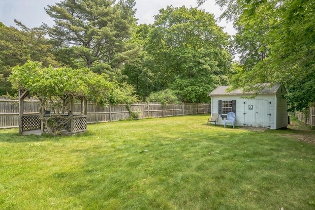 521 Pleasant St, Weymouth, MA 02190 - fenced backyard featuring a storage unit