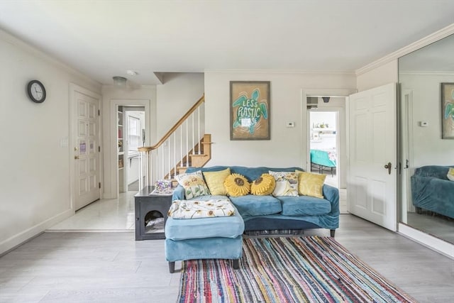 521 Pleasant St, Weymouth, MA 02190 - living area with stairs, light wood-type flooring, and crown molding