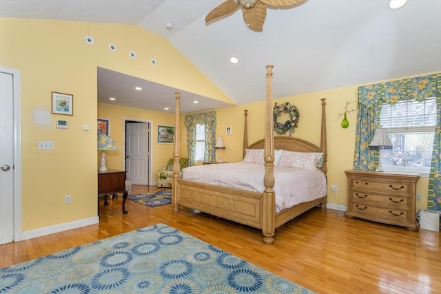 bedroom featuring recessed lighting, light wood finished floors, vaulted ceiling, and baseboards