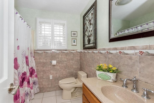 full bathroom with vanity, toilet, tile patterned flooring, and tile walls