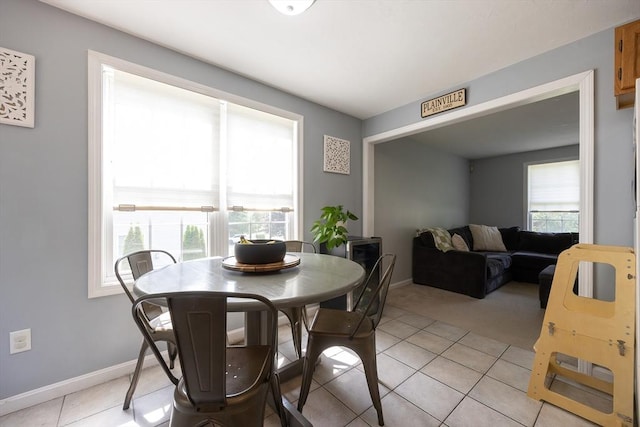 25 Sharlene Ln Unit 25, Plainville, MA 02762 - dining area featuring light colored carpet and light tile patterned flooring