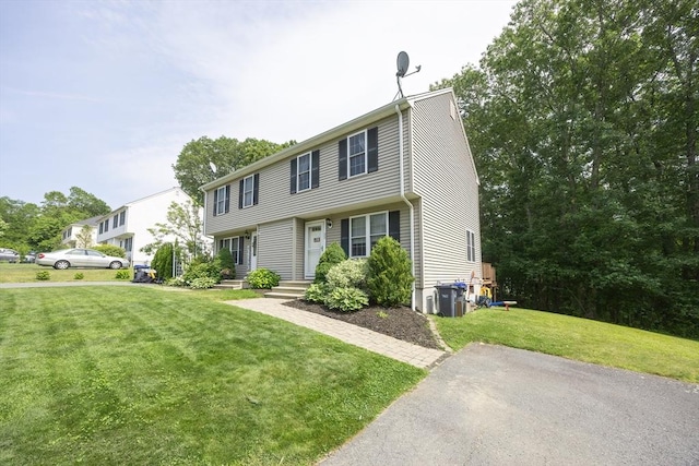 25 Sharlene Ln Unit 25, Plainville, MA 02762 - view of front facade featuring a front yard