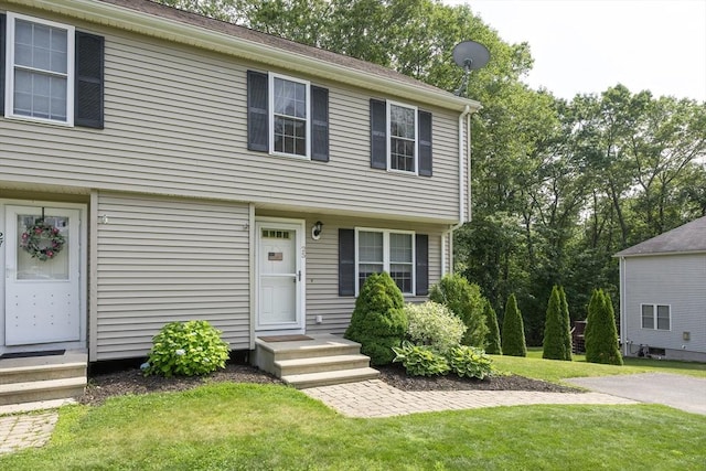 25 Sharlene Ln Unit 25, Plainville, MA 02762 - colonial-style house featuring entry steps and a front yard