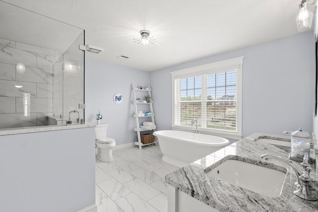 15 Day Lily Ln, Walpole, MA 02081 - bathroom with marble finish floors, a shower stall, baseboards, a freestanding bath, and double vanity