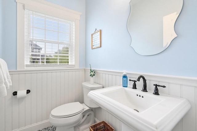 15 Day Lily Ln, Walpole, MA 02081 - bathroom featuring wainscoting, toilet, and a sink