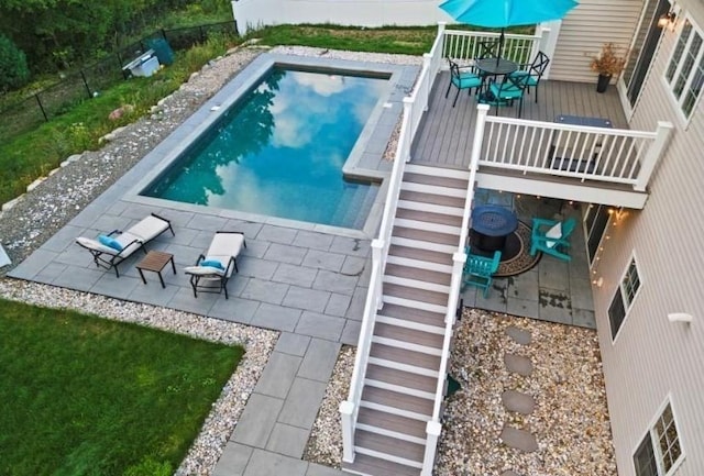 15 Day Lily Ln, Walpole, MA 02081 - view of swimming pool featuring a wooden deck, outdoor dining area, and a patio area