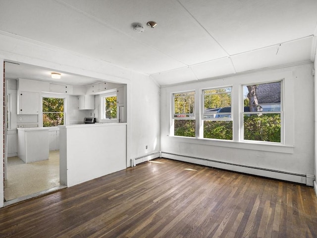 8 Rock Harbor Rd, Orleans, MA 02653 - unfurnished living room with baseboard heating and hardwood / wood-style flooring
