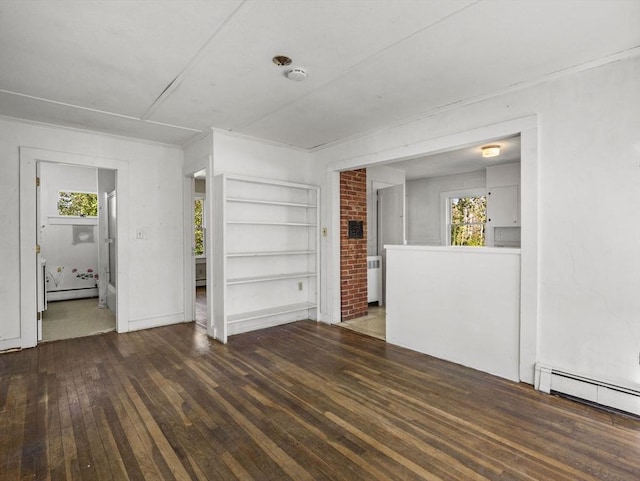 8 Rock Harbor Rd, Orleans, MA 02653 - unfurnished living room featuring healthy amount of natural light, hardwood / wood-style flooring, a baseboard radiator, radiator, and ornamental molding