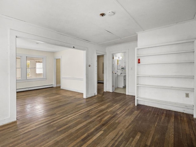 8 Rock Harbor Rd, Orleans, MA 02653 - unfurnished living room featuring a baseboard radiator, wood finished floors, and built in shelves