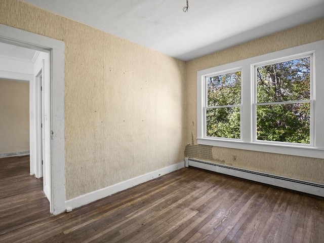 8 Rock Harbor Rd, Orleans, MA 02653 - unfurnished room with wood finished floors, baseboard heating, and baseboards