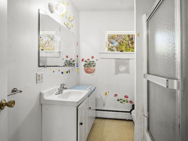 8 Rock Harbor Rd, Orleans, MA 02653 - full bath with a baseboard radiator, an enclosed shower, and vanity