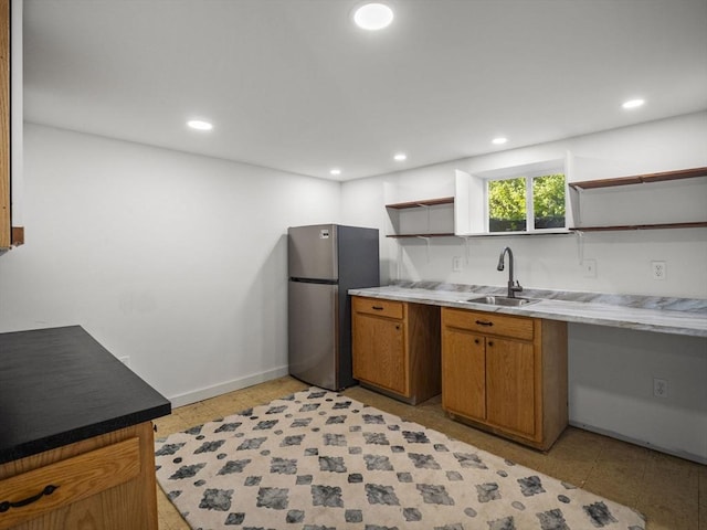 8 Rock Harbor Rd, Orleans, MA 02653 - kitchen with open shelves, freestanding refrigerator, a sink, recessed lighting, and brown cabinets