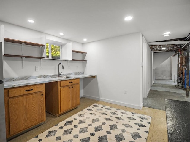 8 Rock Harbor Rd, Orleans, MA 02653 - kitchen with open shelves, a sink, light countertops, recessed lighting, and baseboards