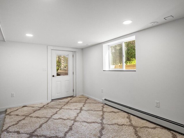 8 Rock Harbor Rd, Orleans, MA 02653 - unfurnished room featuring a baseboard radiator, recessed lighting, healthy amount of natural light, baseboards, and carpet floors