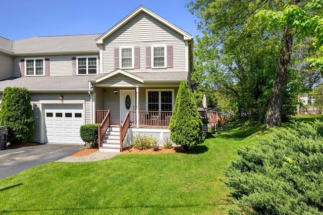 315 Bacon St Unit 1, Natick, MA 01760 - view of front of house with a garage, driveway, covered porch, and a front yard