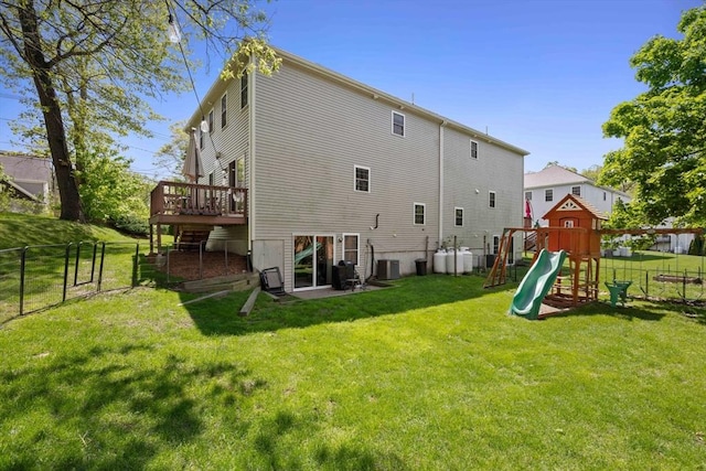 315 Bacon St Unit 1, Natick, MA 01760 - back of house featuring a deck, a playground, and central air condition unit