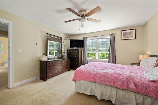 315 Bacon St Unit 1, Natick, MA 01760 - bedroom with light carpet, multiple windows, baseboards, and ceiling fan