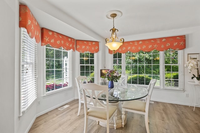 dining room featuring light hardwood / wood-style floors