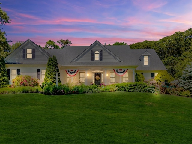 view of front of house featuring a lawn