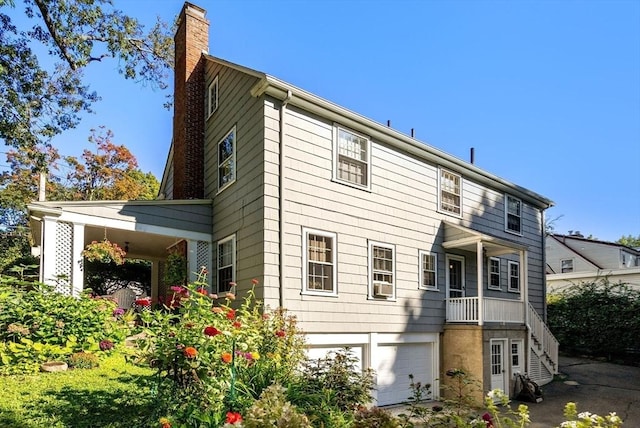view of front of house featuring a chimney