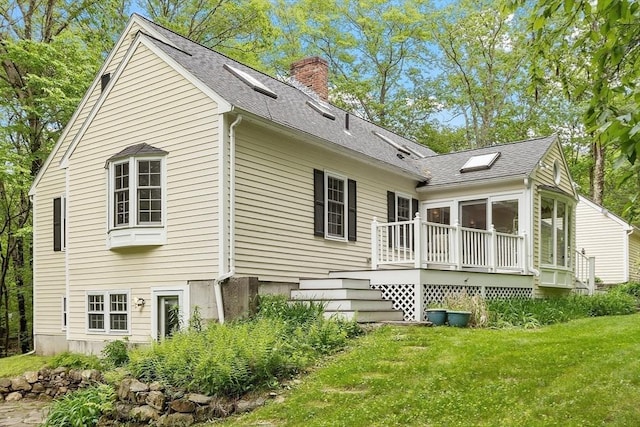 31 Spectacle Hill Rd, Bolton, MA 01740 - rear view of property with a wooden deck, a yard, a chimney, and a shingled roof