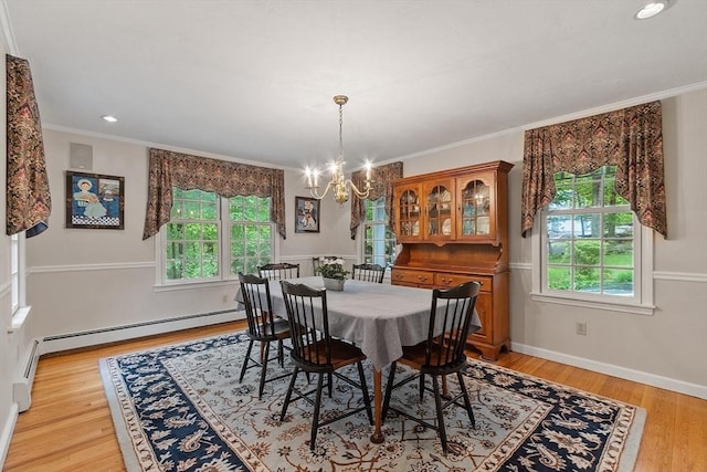 31 Spectacle Hill Rd, Bolton, MA 01740 - dining room with a chandelier, a baseboard heating unit, light wood-style floors, recessed lighting, and ornamental molding