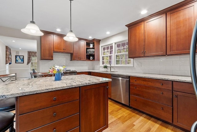 31 Spectacle Hill Rd, Bolton, MA 01740 - kitchen with appliances with stainless steel finishes, light wood finished floors, a sink, open shelves, and pendant lighting