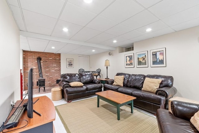 31 Spectacle Hill Rd, Bolton, MA 01740 - living room with a wood stove, recessed lighting, and a paneled ceiling